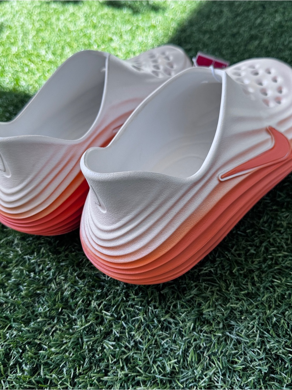 Nike ReactX Rejuven8 Orange Frost Sail Slides